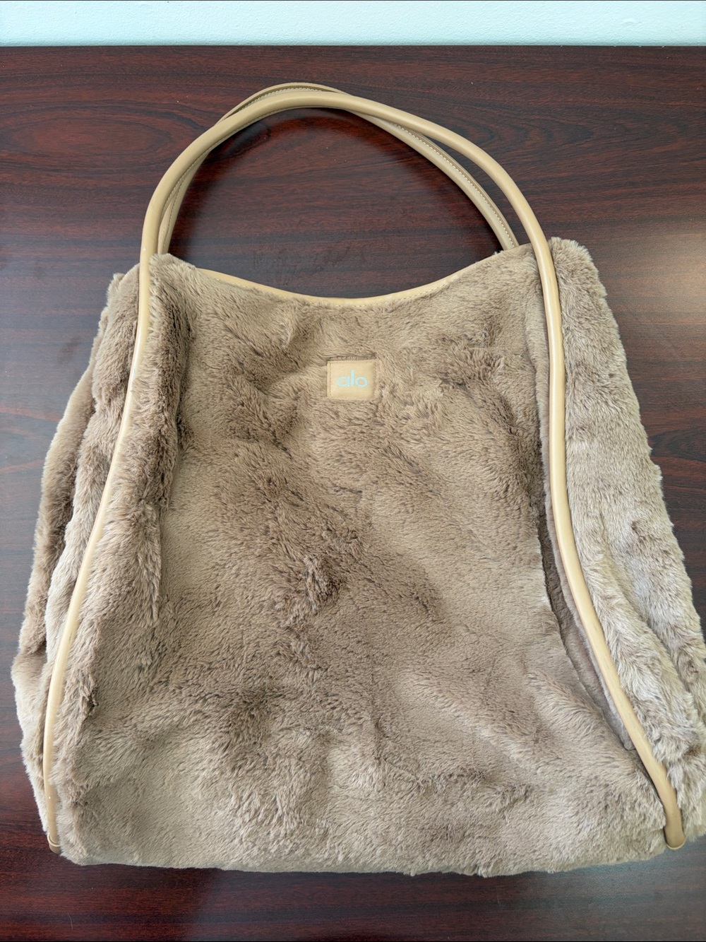 ALO Yoga Plush Faux Fur Tote in Toasted Almomd